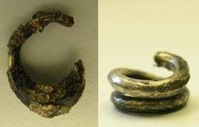 Kristall- (oder Glas ?-) Knöpfe in silbernen Hülsen, deren äußerer Rand mit Blech von Blassgold überzogen war; drei Hülsen erhalten, ein Knopf darin fragmentiert, dazu ein Knopf ohne Hülse