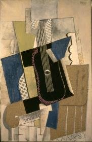 Gitarre und Zeitung