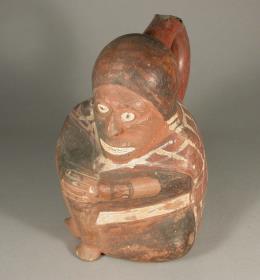 Sitzende anthropomorphe Figur