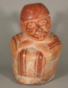 Sitzende anthropomorphe Figur