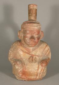 Sitzende anthropomorphe Figur
