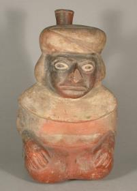Sitzende anthropomorphe Figur