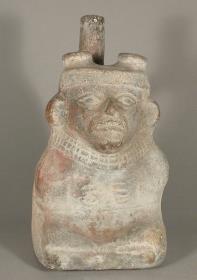 Sitzende anthropomorphe Figur