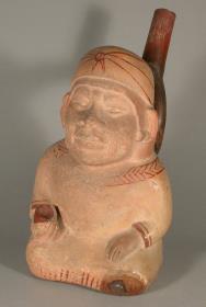 Sitzende anthropomorphe Figur