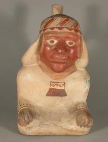 Sitzende anthropomorphe Figur