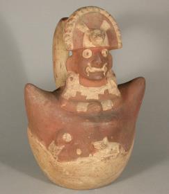 Anthropo-zoomorphe Figur auf einem Berg