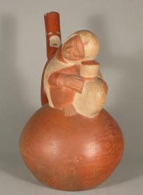 Applikation: anthropomorphe Figur mit Gefäß