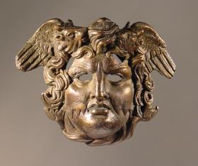 Applik in Form einer Tritonmaske (vielleicht Teil einer römischen Bronzestatue)