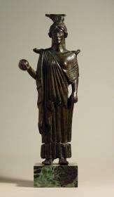 Statuette einer Frau mit Kugel als Spiegelstütze