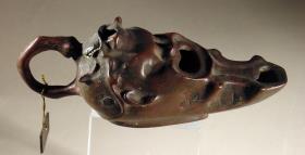 Lampe in Form eines bekränzten Schauspielerkopfes