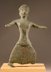 Figur einer laufenden Frau
