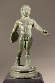 Kandelaberbekrönung. Statuette eines Diskuswerfers