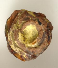 Vielleicht eine Basis  einer Figur oder ein Spielzeug