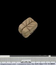quaderförmige Zählmarke (Token) mit Ritzungen