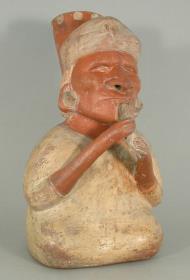 Sitzende anthropomorphe Figur mit Flöte, blind
