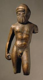 Griechische (?) Statuette eines bärtigen Mannes von barbarischem Aussehen, Beine fehlen vom Knie an