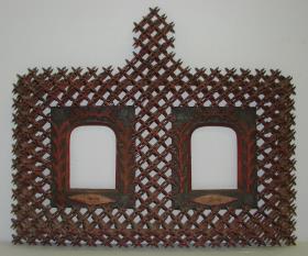 Holzsteckarbeit als Erinnerungsrahmen