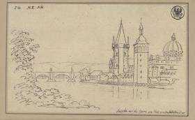 Blick auf die Karlsbrücke in Prag mit dem Altstädter Brückenturm und der Kuppel der Kreuzherrenkirche