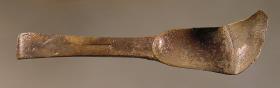 Strigilis mit griechischem Fabrikstempel "PALYMMACHOU"