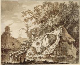 Wassermühle unter hohen Bäumen. Das Dach des Mühlengebäudes reicht bis zum Boden