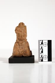 knieende kopflose Holzstatuette