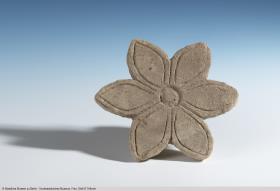 Einlage in Form einer Rosette
