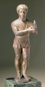 Etruskische Statuette eines Kriegers mit Brustpanzer und Beinschienen